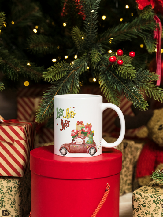 Caneca de Natal em cerâmica branca com estampa temática natalícia.